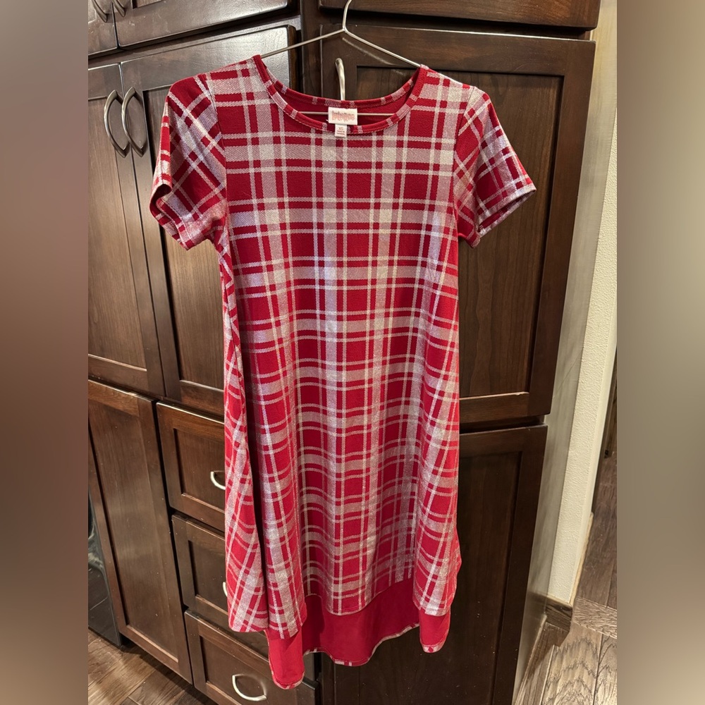 LuLaRoe short sleeve high low red dress with silver pattern.